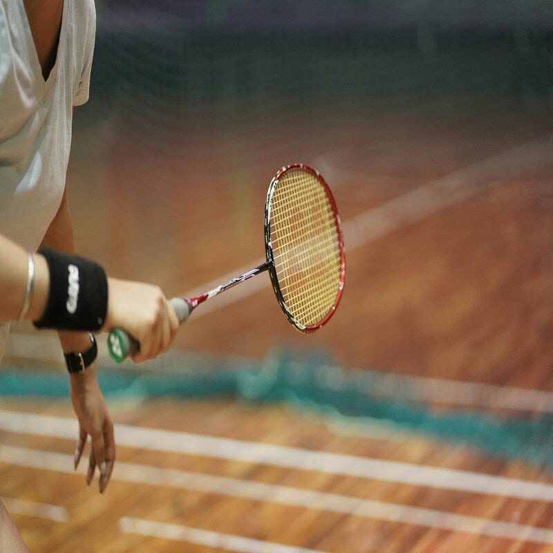 Fast badminton rally with quick net play — Yonex head-light Nanoflare racquets for speed, control and fast reactions