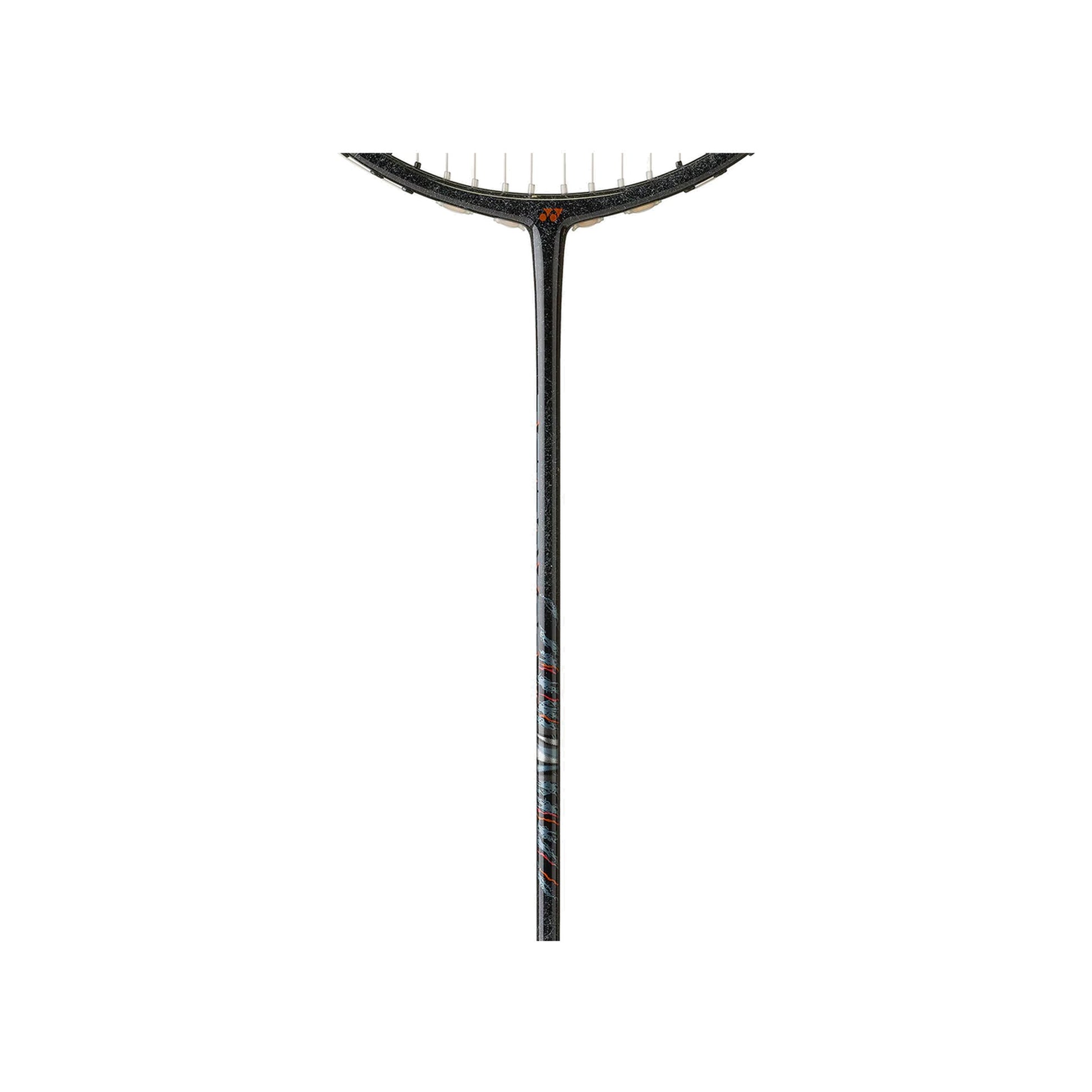 Close-up of the Yonex Astrox 99 Game badminton racquet shaft showing marbled black graphite finish with orange and blue