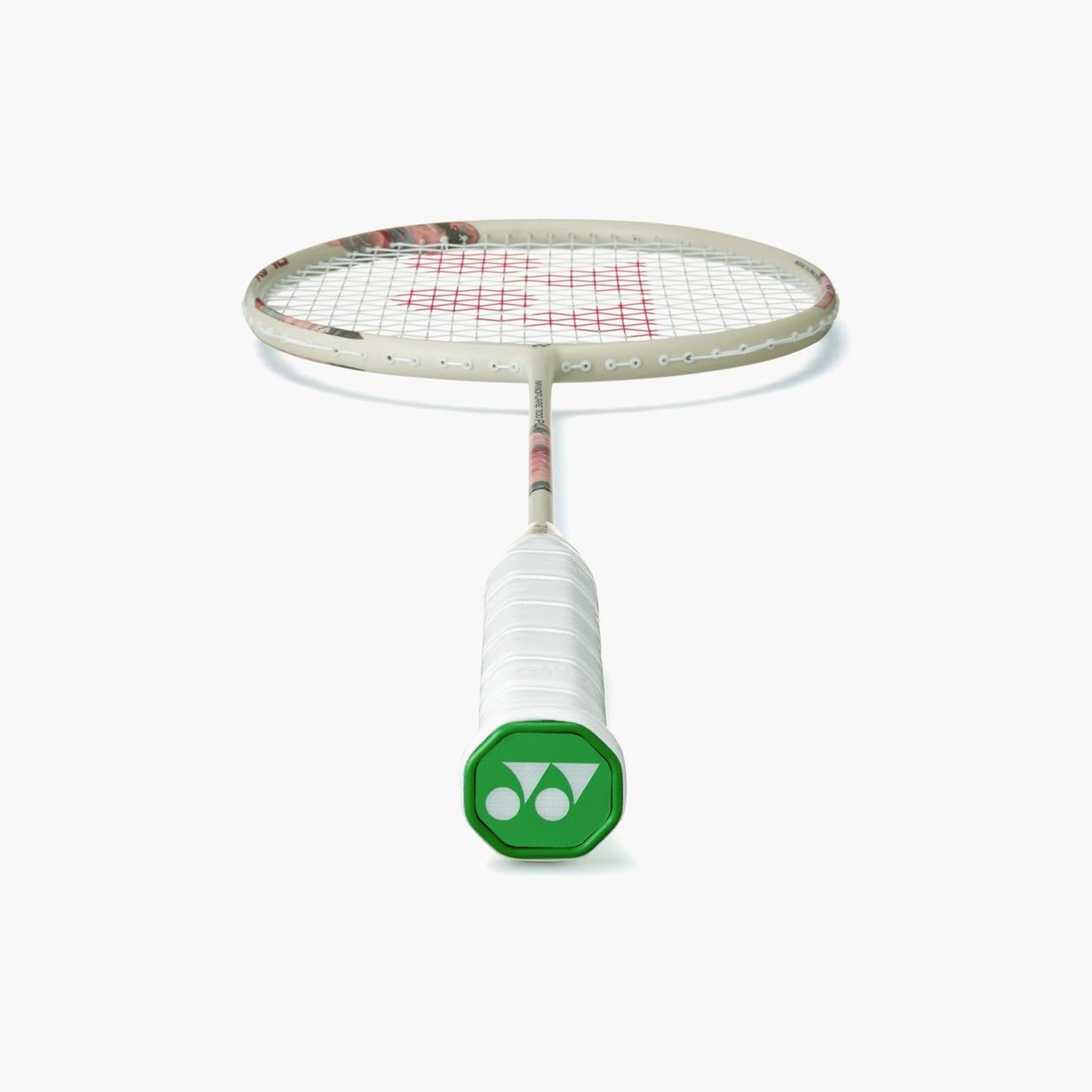 Close-up of the Yonex Nanoflare 700 Play badminton racquet shaft showing model branding and floral graphic on a cream finish