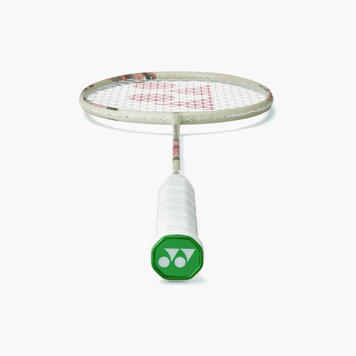 Close-up of the Yonex Nanoflare 700 Play badminton racquet shaft showing model branding and floral graphic on a cream finish
