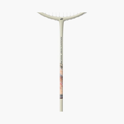 Angled view of the Yonex Nanoflare 700 Play badminton racquet head and grip, showing silver frame and green Yonex end-cap logo